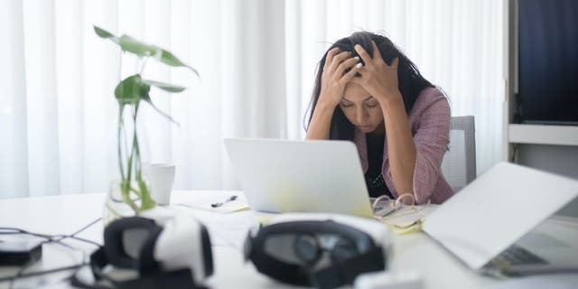 Stressed woman at work