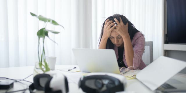 Stressed woman at work
