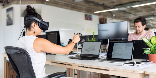 A woman working with VR