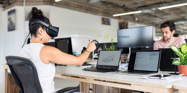 A woman working with VR