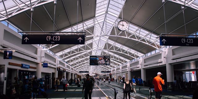 People traveling in the airport