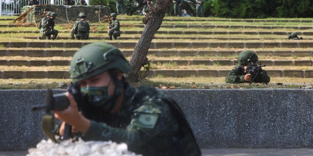 FILE PHOTO: Soldiers take position during Taiwan's main annual