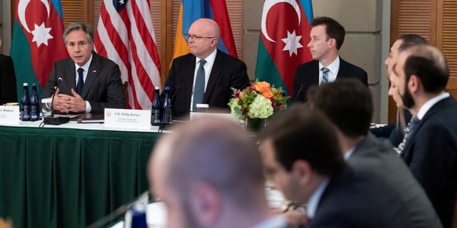 Secretary of State Antony Blinken, top left, speaks during a meeting with Azerbaijan's Foreign Minister Jehun Aziz oglu Bayramov and Armenia's Foreign Minister Ararat Mirzoyan, Monday, Nov. 7, 2022, at Blair House in Washington.