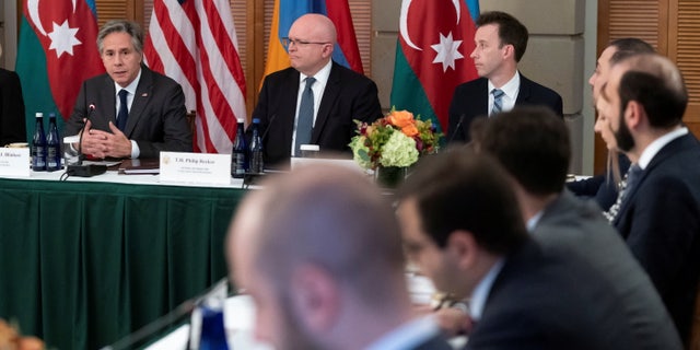 Secretary of State Antony Blinken, top left, speaks during a meeting with Azerbaijan's Foreign Minister Jehun Aziz oglu Bayramov and Armenia's Foreign Minister Ararat Mirzoyan, Monday, Nov. 7, 2022, at Blair House in Washington.