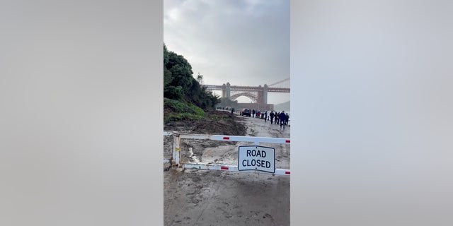 A road is seen closed near the Golden Gate bridge following storms in San Francisco, California, U.S. January 5, 2023, in this screen grab obtained from social media video.
