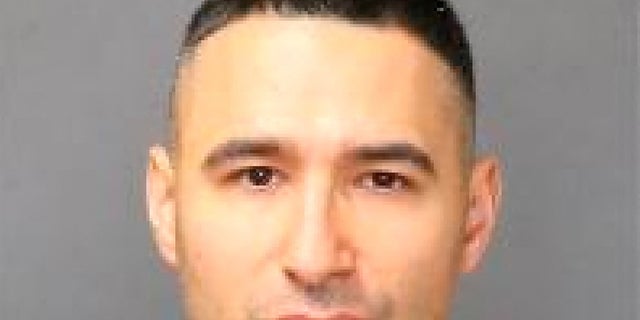 Solomon Pena poses for a jail booking photograph after his arrest by the Albuquerque Police Department in Albuquerque, New Mexico, U.S. January 17, 2023.  