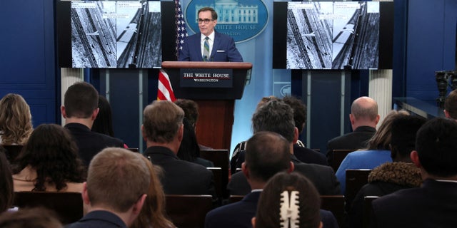 White House National Security Council Strategic Communications Coordinator John Kirby presents images that allege railcar movement between Russia and North Korea, during a press briefing at the White House in Washington, U.S., January 20, 2023.