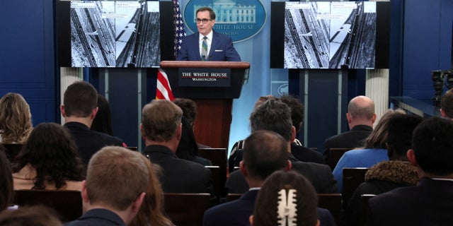 White House National Security Council Strategic Communications Coordinator John Kirby presents images that allege railcar movement between Russia and North Korea, during a press briefing at the White House in Washington, U.S., January 20, 2023. 