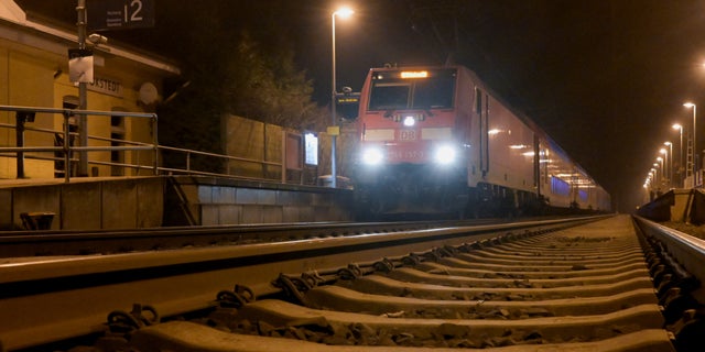 A train stands at a station in Brokstedt, Germany, after an incident involving a knife attack took place while the train was traveling between Kiel and Hamburg on Jan. 25, 2023.