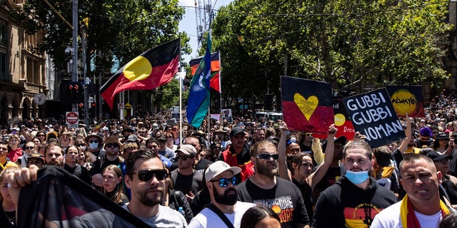 People participate in the 'Invasion Day' rally in Melbourne, January 26, 2023. AAP 