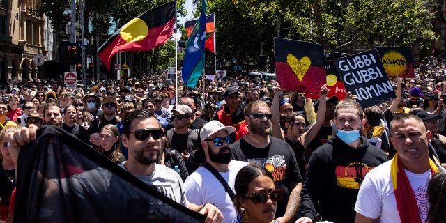 People participate in the 'Invasion Day' rally in Melbourne, January 26, 2023. AAP