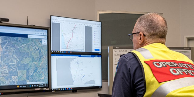 A member of the Incident Management Team coordinates the search for a radioactive capsule that was lost in transit by a contractor hired by Rio Tinto, at the Emergency Services Complex in Cockburn, Australia.