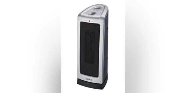 Photo of a Lasko oscillating digital ceramic tower heater. An alternative to using your heater to help save money. (Credit: Lasko)
