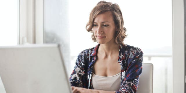 Woman working on her laptop 