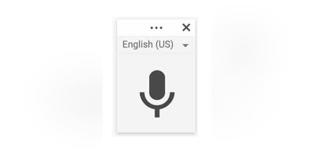 Close-up image of the Google microphone button.