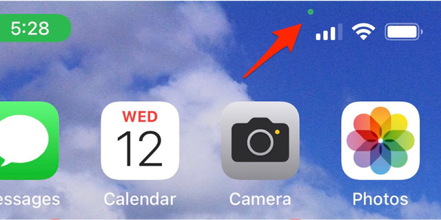 Here's how the green dot appears on your iPhone.