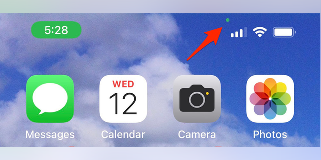 Here's how the green dot appears on your iPhone.