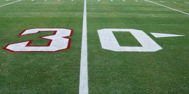 A view of the 30-yard line painted in honor of Buffalo Bills No. 3 Damar Hamlin before a game between the Jacksonville Jaguars and the Tennessee Titans at TIAA Bank Field on January 7, 2023 in Jacksonville, Florida.