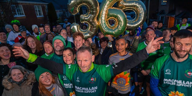 McKee celebrated with his community after he completed his 365 marathons and raised over a million pounds (about $1.2 million) for charity.