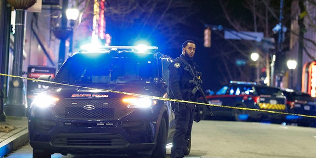 Police block downtown streets following a protest, Saturday, Jan. 21, 2023, in Atlanta, in the wake of the death of an environmental activist killed after authorities said the 26-year-old shot a state trooper. 