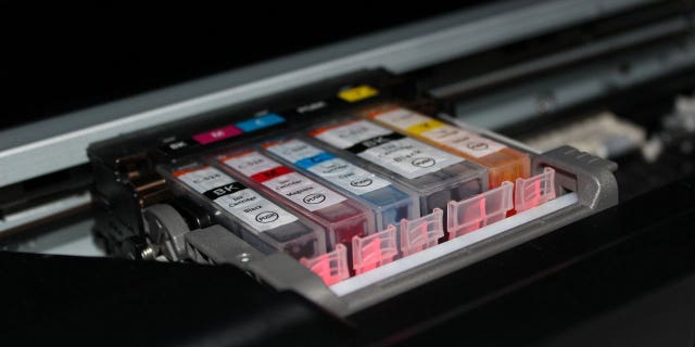 Some printers use cartridge-less ink tanks that can be refilled via bottles.