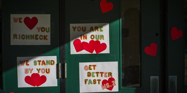 Messages of support for teacher Abby Zwerner, who was shot by a 6 year old student, grace the front door of Richneck Elementary School Newport News, Va. on Monday Jan. 9, 2023. 