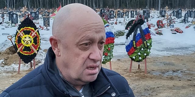 Wagner Group Chairman Yevgeny Prigozhin attends the funeral of Dmitry Menshikov, a fighter from the Wagner Group who died during a special operation in Ukraine, at Belostrovskoye Cemetery outside Saint Petersburg, Russia, on Saturday, December 24, 2022. 