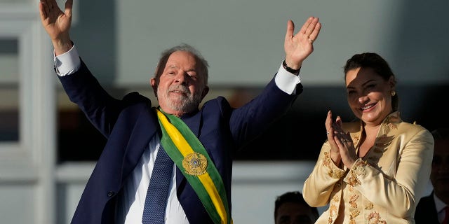 Brazil President Luiz Inacio Lula da Silva waves at inauguration