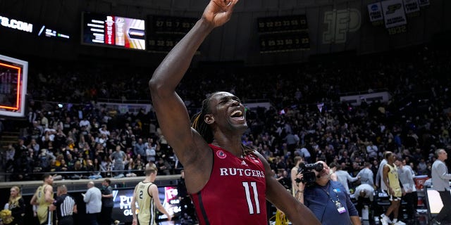 Rutgers center Clifford Omoruyi, #11, celebrates after an NCAA college basketball game against Purdue in West Lafayette, Indiana on Monday, January 2, 2023. Rutgers defeated Purdue 65-64.