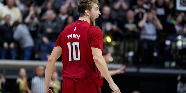 Rutgers guard Cam Spencer, #10, celebrates after scoring the go-ahead basket in the final seconds during the second half of an NCAA college basketball game against Purdue in West Lafayette, Ind., Monday, Jan. 2 2023. Rutgers defeated Purdue 65-64.