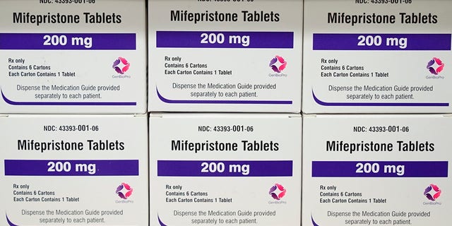 Abortion pills are at the center of a possible power grab by the Biden administration. FILE - Boxes of the drug mifepristone sit on a shelf at the West Alabama Women's Center in Tuscaloosa, Ala., on March 16, 2022.
