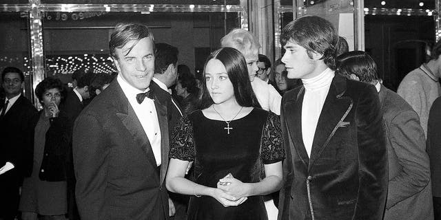 "Romeo and Juliet" director Franco Zeffirelli, left, Olivia Hussey and Leonard Whiting are seen after the Parisian premiere of the film on Sept. 25, 1968.