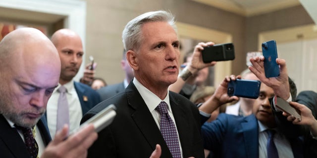Rep. Kevin McCarthy, R-Calif., talks to reporters after the House voted to adjourn for the evening as the House met for a second day to elect a speaker and convene the 118th Congress in Washington, Wednesday, Jan. 4, 2023. 
