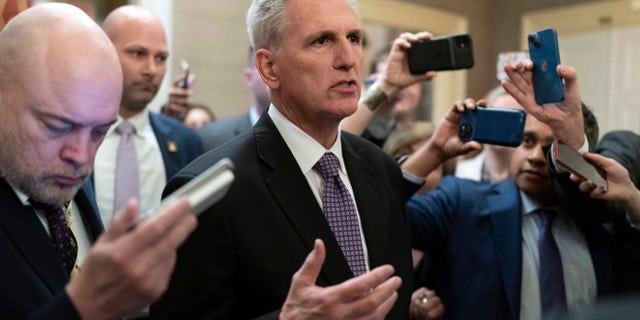 Rep. Kevin McCarthy, R-Calif., talks to reporters after the House voted to adjourn for the evening as the House met for a second day to elect a speaker and convene the 118th Congress in Washington, Wednesday, Jan. 4, 2023. 