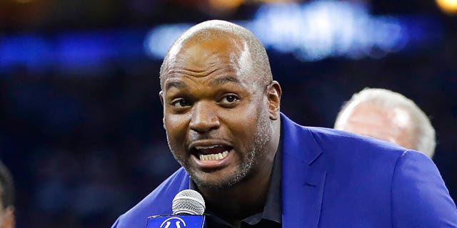 FILE - Former Indianapolis Colts defensive end Dwight Freeney speaks during his Ring of Honor induction ceremony during halftime of an NFL football game against the Miami Dolphins in Indianapolis on Nov. 10, 2019. Freeney is a finalist in his first year of eligibility for the Pro Football Hall of Fame’s class of 2023.
