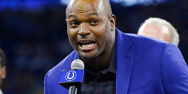 FILE - Former Indianapolis Colts defensive end Dwight Freeney speaks during his Ring of Honor induction ceremony during halftime of an NFL football game against the Miami Dolphins in Indianapolis on Nov. 10, 2019. Freeney is a finalist in his first year of eligibility for the Pro Football Hall of Fame’s class of 2023.