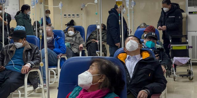 Patients receive intravenous drips in the emergency ward of a hospital in Beijing on Jan. 5, 2023.