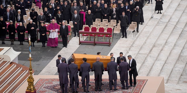 The coffin of late Pope Emeritus Benedict XVI is brought to St. Peter's Square for a funeral mass at the Vatican, Thursday, Jan. 5, 2023. 