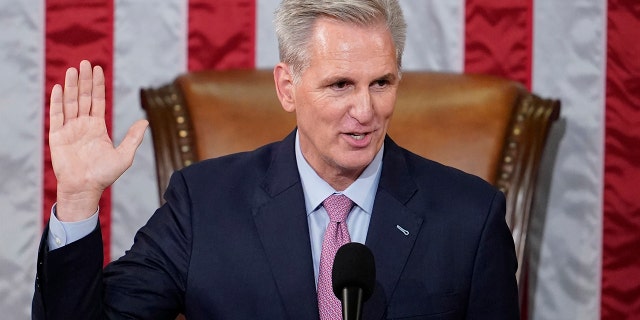 Dean of the House Rep. Hal Rogers, R-Ky., swears in Rep. Kevin McCarthy, R-Calif., as House Speaker on the House floor at the U.S. Capitol in Washington, early Saturday, Jan. 7, 2023. 