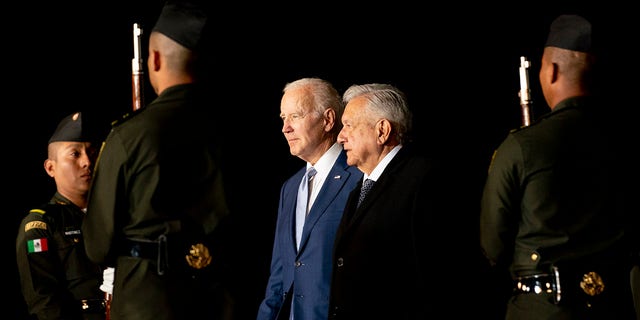 President Biden is greeted by Mexican President Andres Manuel Lopez Obrador as he arrives at the Felipe Angeles international airport in Zumpango, Mexico, Sunday, Jan. 8, 2023. 