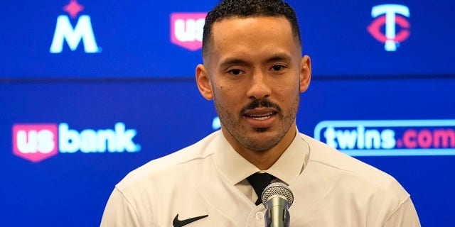 The Minnesota Twins' Carlos Correa speaks to the media at Target Field Wednesday, Jan. 11, 2023, in Minneapolis. The team and Correa agreed to a six-year, $200 million contract.