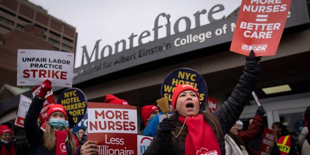 Protestors march on the streets around Montefiore Medical Center during a nursing strike, Wednesday, Jan. 11, 2023, in the Bronx borough of New York. 
