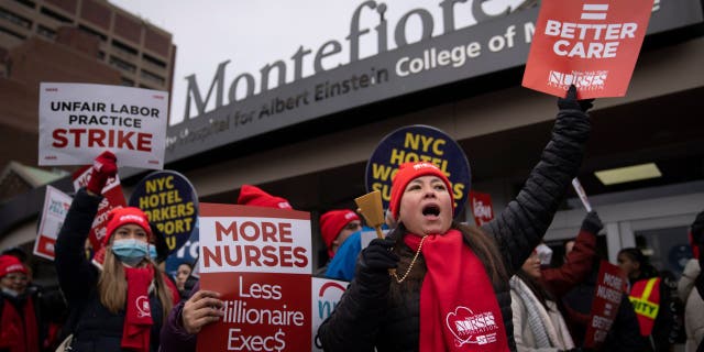 Protestors march on the streets around Montefiore Medical Center during a nursing strike, Wednesday, Jan. 11, 2023, in the Bronx borough of New York. 