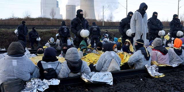 Activists block rail tracks to RWE's Neurath II lignite-fired power plant Following the eviction of L'tzerath, coal opponents continued their protests at several locations in North Rhine-Westphalia on Tuesday morning. 