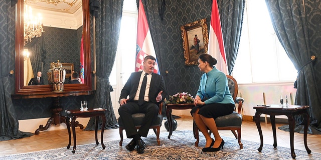 Hungarian President Katalin Novak, right, and Croatian President Zoran Milanovic hold a bilateral meeting in the presidential Alexander Palace in Budapest, Hungary, Friday, Jan. 20, 2023.