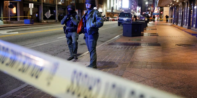 Police block a downtown street following a protest, Saturday, Jan. 21, 2023, in Atlanta, in the wake of the death of an environmental activist killed after authorities said the 26-year-old shot a state trooper.