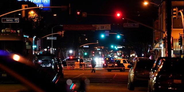 Police investigate a scene where a shooting took place in Monterey Park, Calif., Sunday, Jan. 22, 2023. 