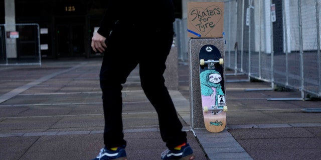 Skateboarders skate in front of city hall in remembrance of Tyre Nichols, who died after being beaten by Memphis police officers, five of whom have been fired, in Memphis, Tenn., Monday, Jan. 23, 2023. 