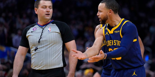 Golden State Warriors guard Stephen Curry reacts after being charged with a technical foul during the Memphis Grizzlies game in San Francisco, Wednesday, Jan. 25, 2023. Curry was ejected.