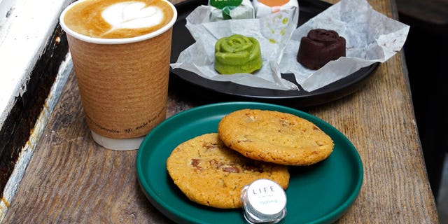 Coffee, biscuits, green tea and chocolate mooncake that contain cannabidiol, or CBD, are displayed at the Found Cafe in Hong Kong on Sept. 13, 2020.